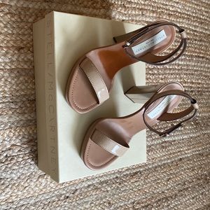Stella McCartney beige platform ankle strap sandals.
